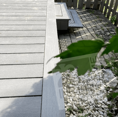 Grey Composite deck with floating staircase