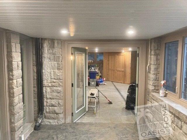 Basement with stamped concrete and wood work