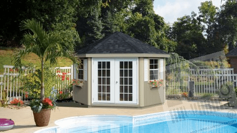 Shed by pool outdoors with fence